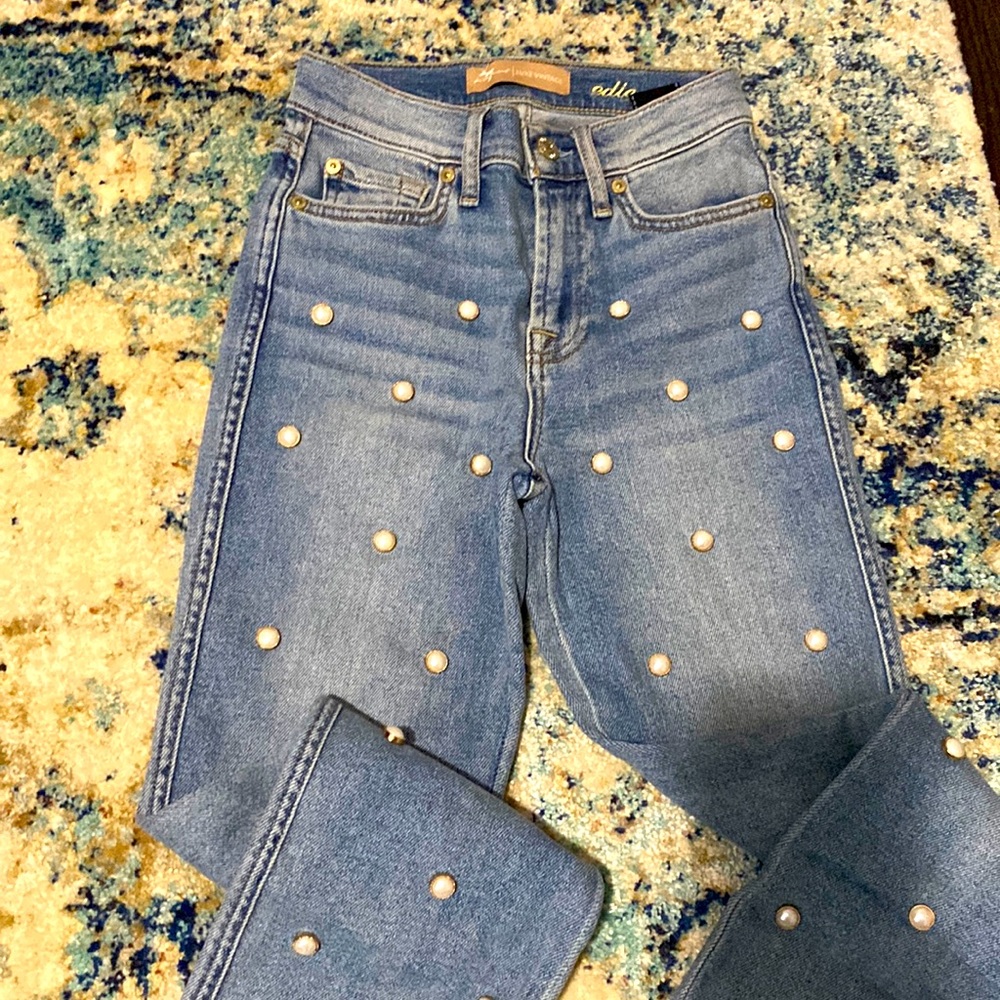 7 for all Mankind blue jeans with pearl design.
